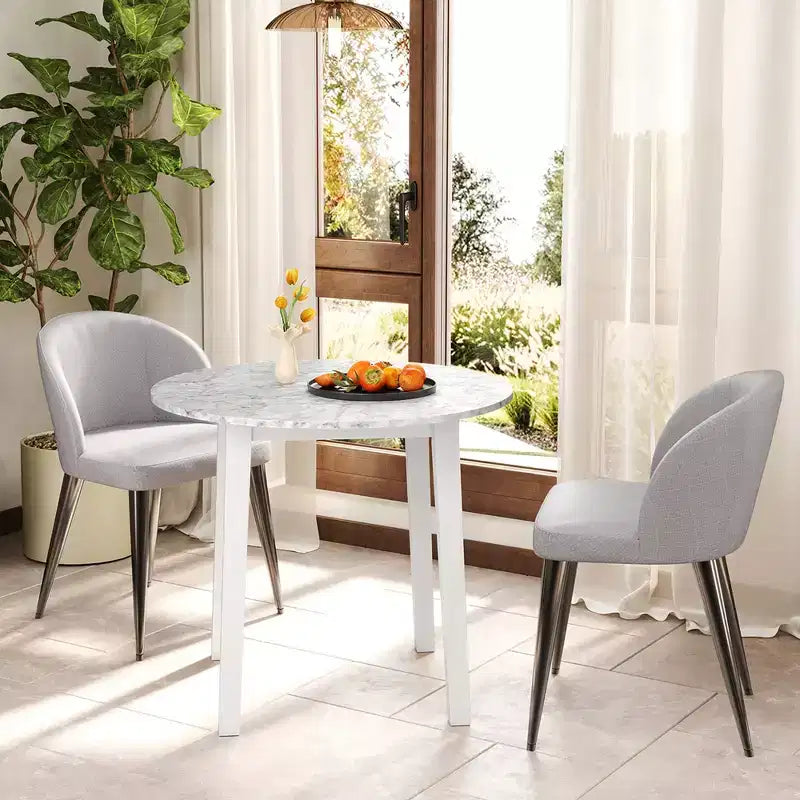 Table à manger ronde avec plateau imitation marbre