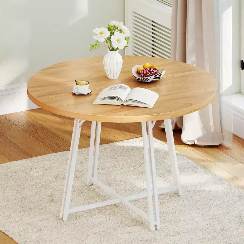 Table à manger avec 8 pieds de support en métal et une base en forme de croix.