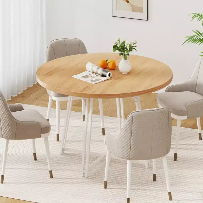 Table à manger avec 8 pieds de support en métal et une base en forme de croix.