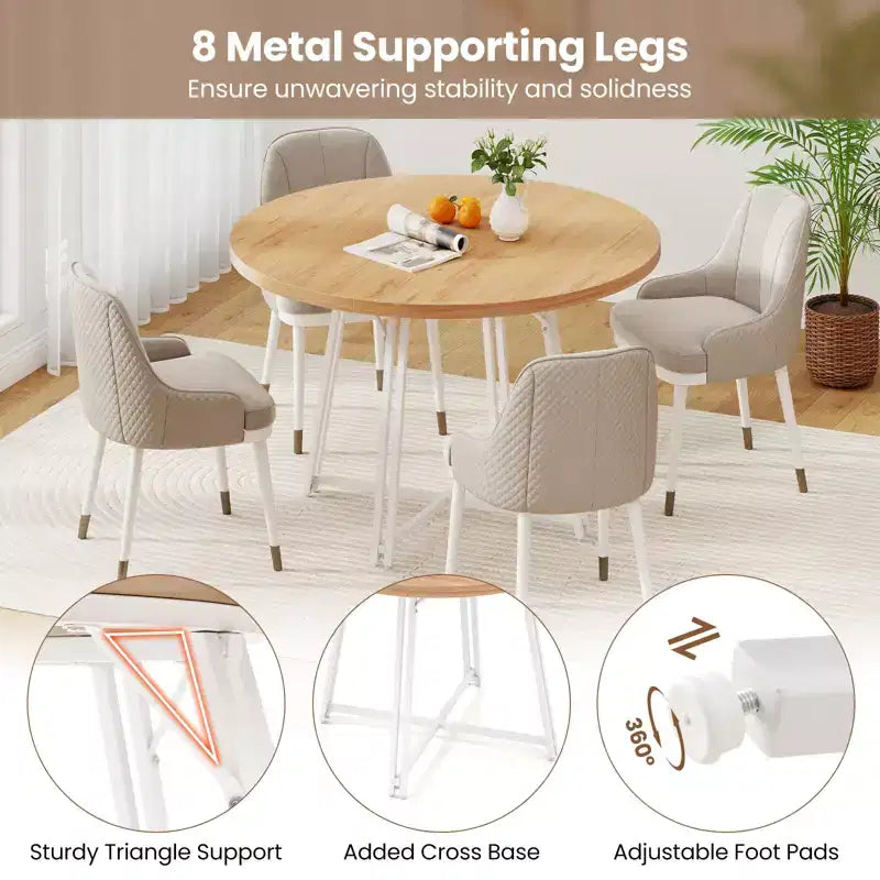 Table à manger avec 8 pieds de support en métal et une base en forme de croix.