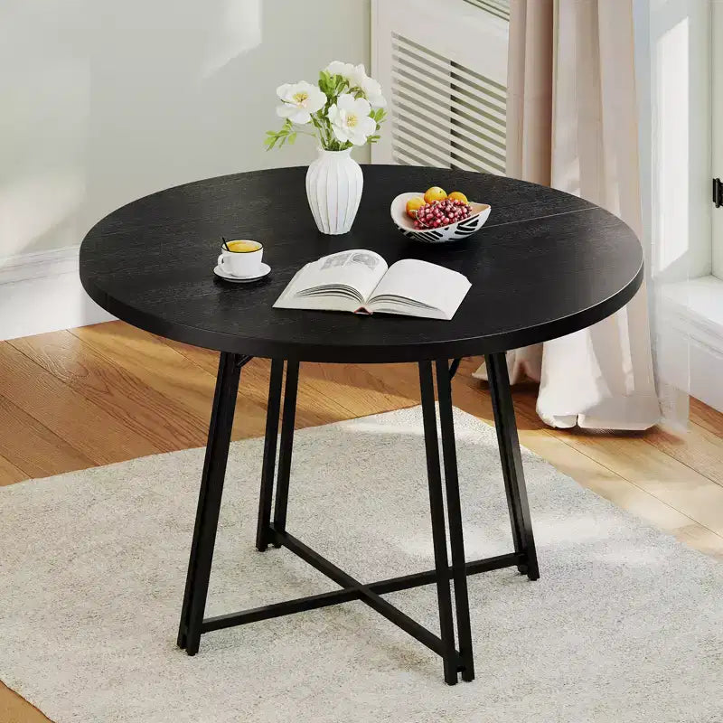 Table à manger avec 8 pieds de support en métal et une base en forme de croix.